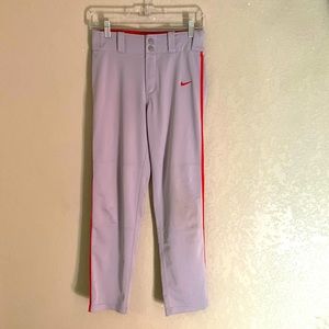 Gray Nike baseball pant with red strip down leg, Youth Large